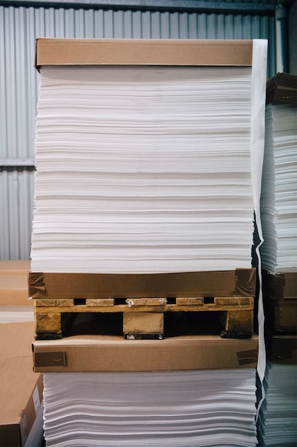 The recycled material is shipped after being dried and pressed into sheets.