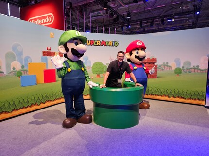 Luigi, me and Mario (FLTR) at the Nintendo booth.