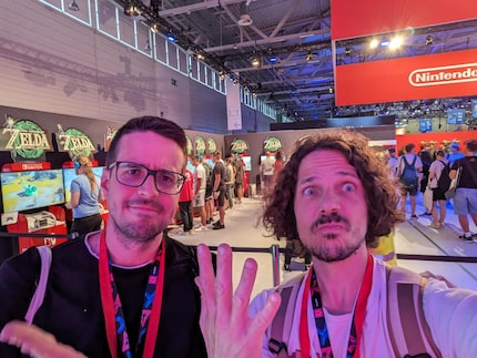 Phil and I searching in vain for the new Mario games at the Nintendo booth. Instead, we found a whole lot of Zelda stations.