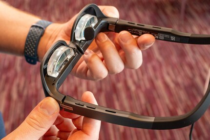 The image is projected into the thick glass panes.