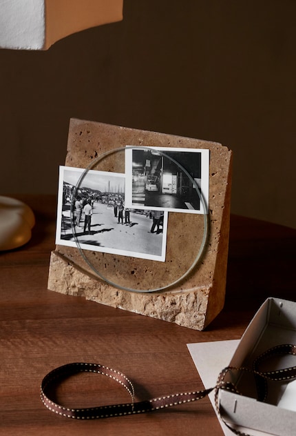 Unusual picture frames like this one draw attention to what is on display.