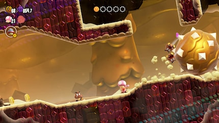 Toadette rennt ganz im Stile von Indiana Jones vor einer riesigen Killer-Kugel weg.
