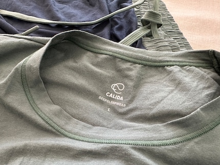 Im Shirt ist das eigens neu kreierte Logo zu sehen.