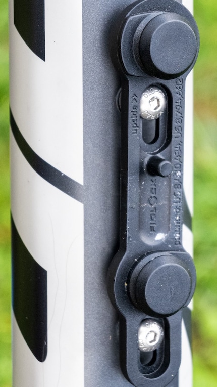 The bottle holder on the frame ...