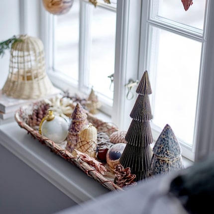 Paper Christmas trees look lovely, even without illumination.