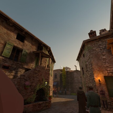Monteriggioni: la cittadina ha un aspetto vivace. Sulla sinistra dell'immagine si vede la punta del naso di Ezio.