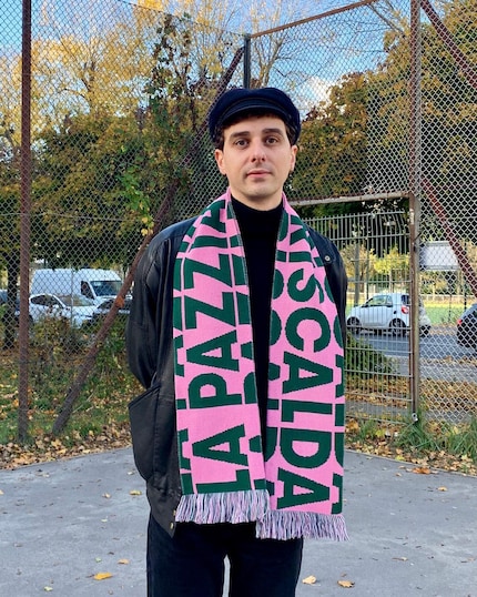 Colourful highlight to the all-black look.