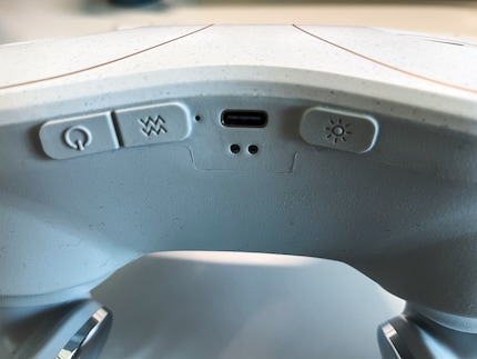 Even a few buttons are difficult to operate when they are on the back of your neck.