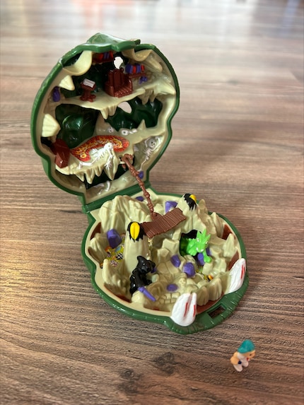 Polly Pocket für Jungen: Die Mighty Max-Schatullen enthielten kleine Kämpfer und starke Drachen.