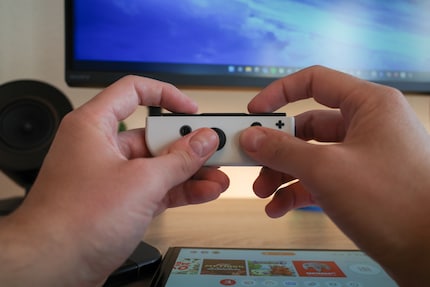 The Joy-Cons disappear in my hands.