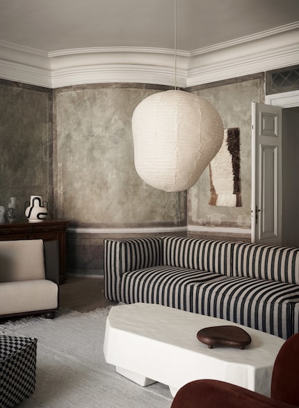 This lantern completes the seating area above the coffee table.