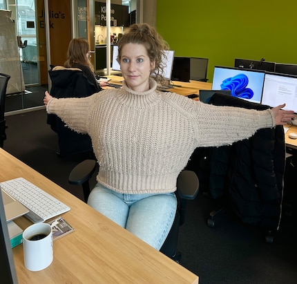 Stretch your arms out and pull them back until you feel a slight stretch.