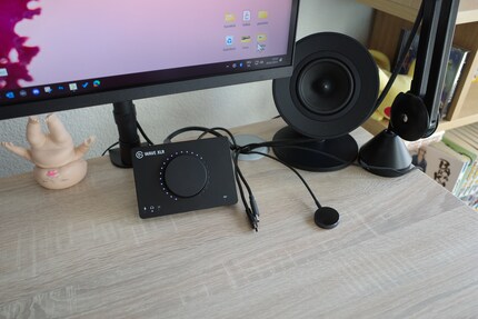 Some cables that I often use emerge from a hole in the desk. Including the charger for my smartwatch.