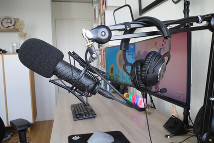 I only use the Logitech G Pro X headset hanging on the stand for team calls and the like.