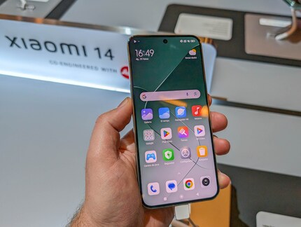 The Xiaomi 14 is slightly more compact than the Ultra model.