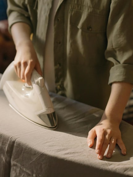 Use your hand to smooth out the fabric.