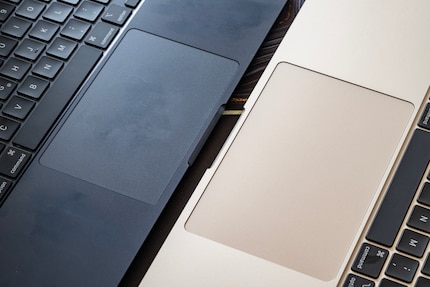 Midnight blue (left) is a magnet for fingerprints. Starlight (right) looks cleaner for longer.