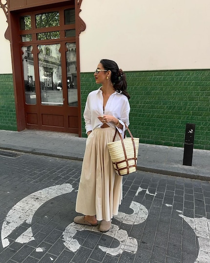 Le sabot Birkenstock va aussi bien avec une robe ...