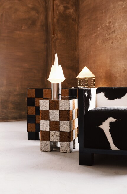 The «Xadrez» collection, including an armchair, is made of coconut fibre, enamel paint and natural cowhide.