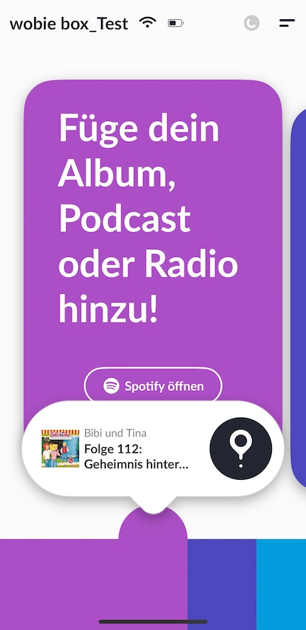 You assign the rainbow buttons via the Wobie app and Spotify.