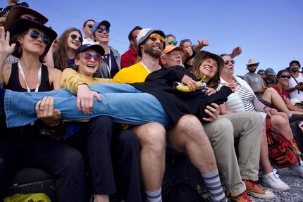 On a high: fans celebrate with world champion Cecilia Stock.