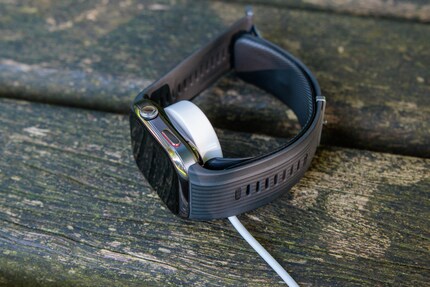 The standard wristband only charges upright.