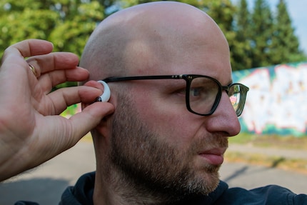 Pressing the Ear (open) feels less strange than it looks.