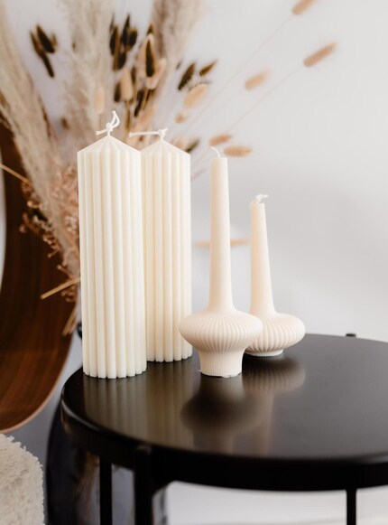 Grooved designs add an interesting tactile dimension to wax sculptures.