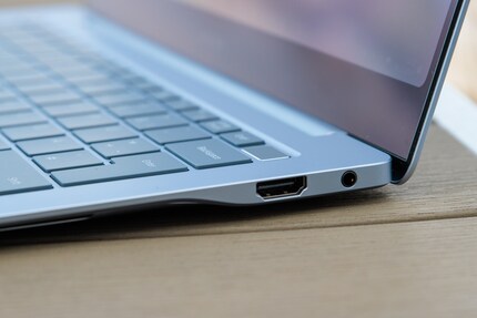 The HDMI port and headphone jack on the right side of the Galaxy Book.