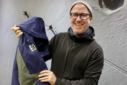 Founder Tristan Winkler with the first jacket he and his former business partner designed.