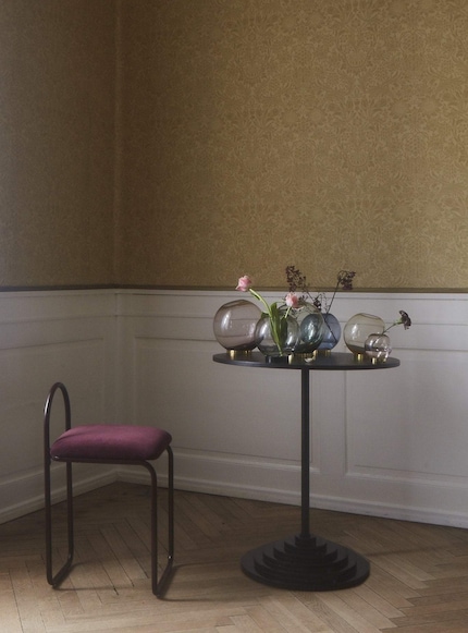 This spherical vase sets the scene for flowers, but also cuts a fine figure without them.