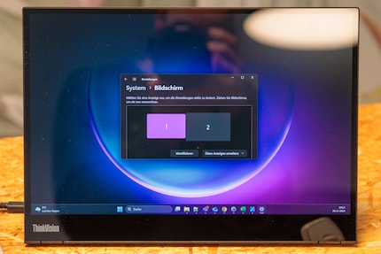 Dans les paramètres d'affichage, choisissez de quel côté se trouve l'écran externe.