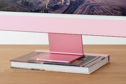 The monitor isn’t height-adjustable. Books help with that, but they ruin the clean look.