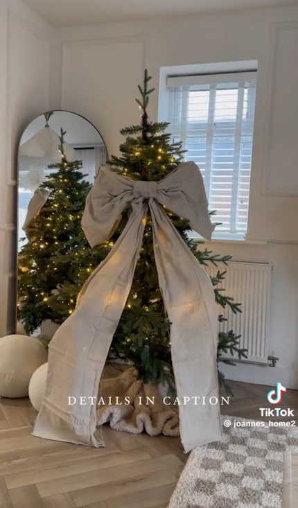Large bows are strategically placed at the top to create an accent ...