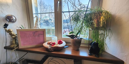 ... or on the windowsill in the dining room, the frame stands.