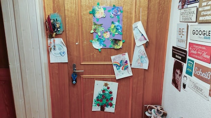 ... or on the front door, Zoe's artwork hangs everywhere.