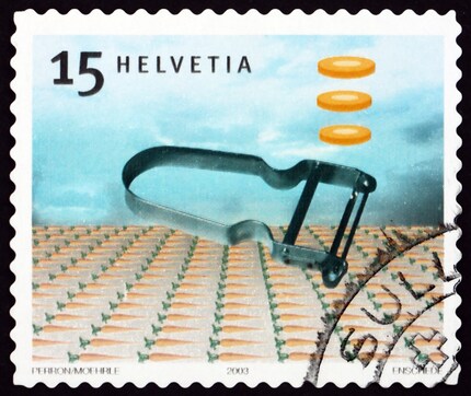 You better not lick the blade of the peeler, but you can lick his own stamp.