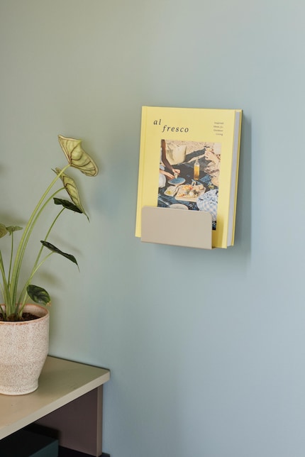 The name clutch probably comes from the fact that, like a clutch handbag, it is inspired by fashion - both are pretty and practical.