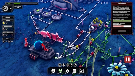 The red queen in the middle is fed with yellow energy balls to produce larvae. These will grow into small workers inside incubators.