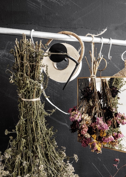 A dried bouquet of flowers will bring colour to your space.