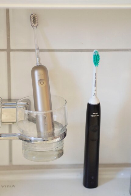 It even fits in the toothbrush glass under the mirror cabinet.