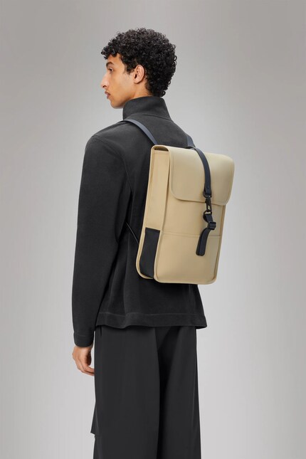 The mini version of the Rains backpack offers enough space for a 13-inch laptop.