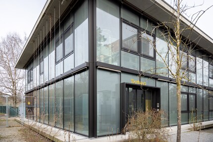 People who live in glass houses... have a bright home. This shelter is anything but gloomy.