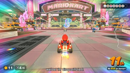 Mario nähert sich einem Checkpoint und muss mindestens an achter Stelle durchfahren..