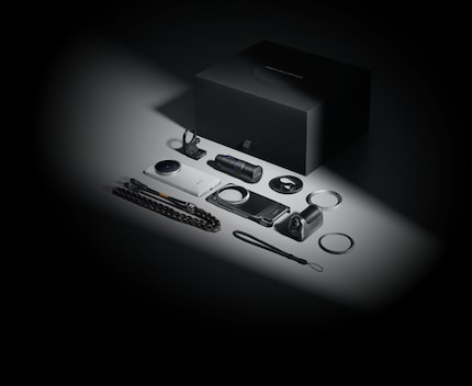 The contents of the Photographer Kit next to the Vivo X200 Ultra.