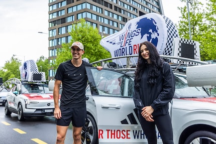 Decathletes Simon and Tatjana Ehammer drive the Catcher Car.
