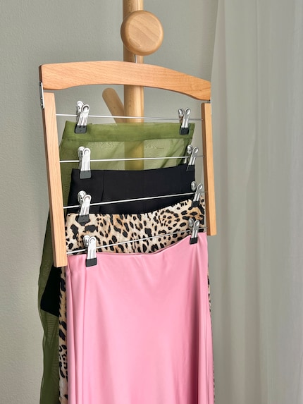 A space-saving way to hang up skirts.