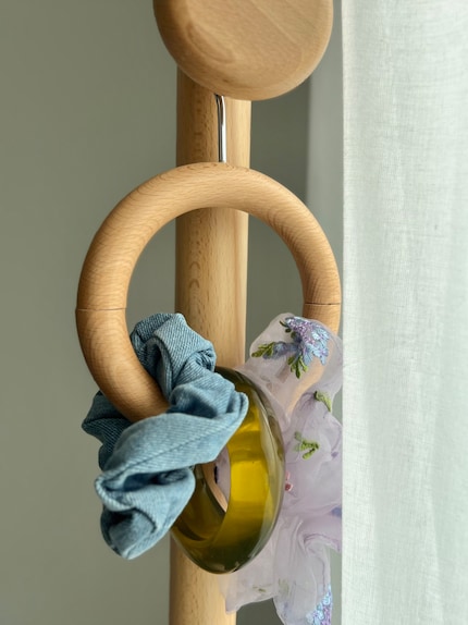 An atypical shape for clothes hangers.