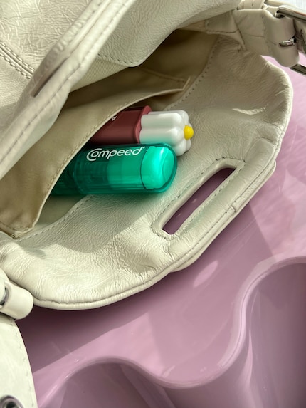 The stick’s about the size of a lipstick and can be easily stored in your bag.