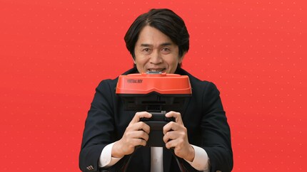 Yoshiaki Koizumi from Nintendo demonstrates how uncomfortable the Virtual Boy is.